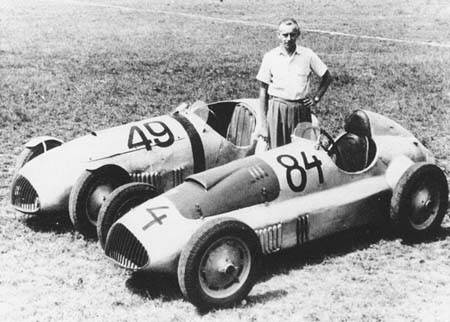 Von Falkenhausen stands between his AFM Type 1949 monoposto probably the 